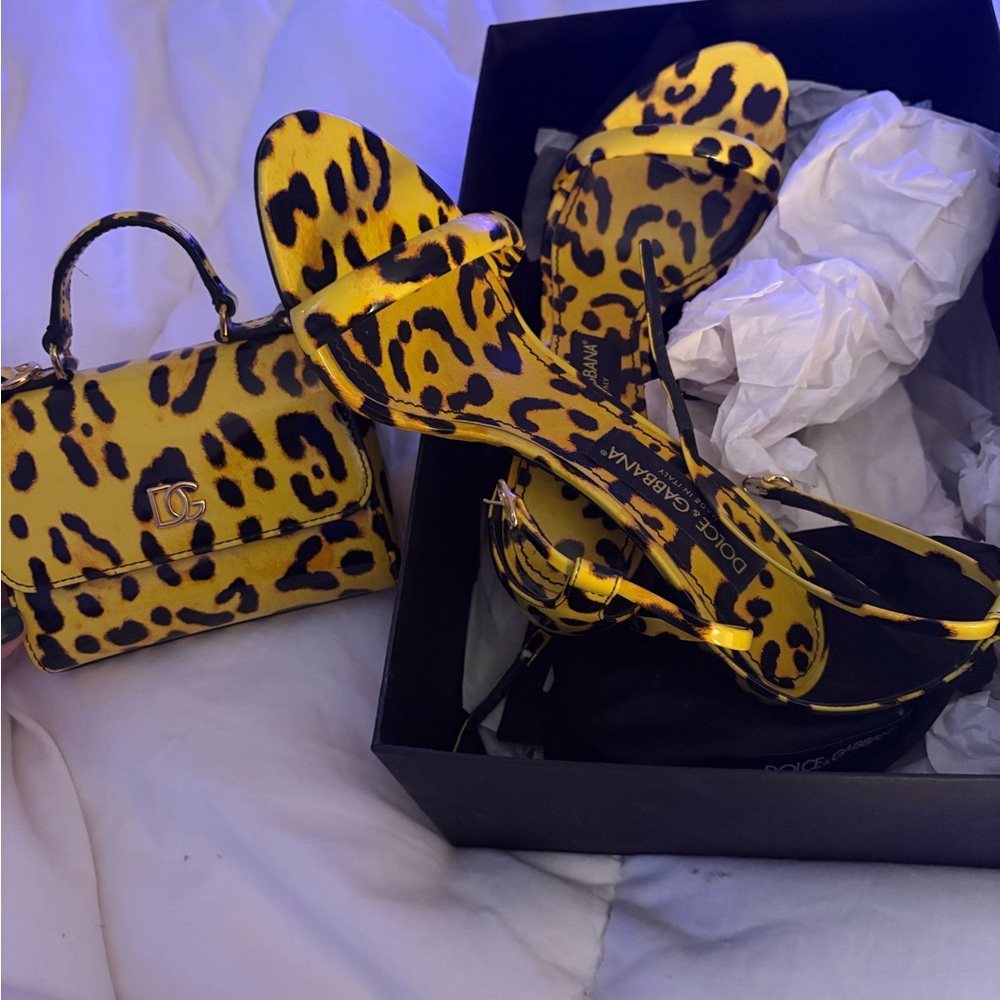 Size 39 Dolce Gabbana heels and mini purse. Both only worn twice.
